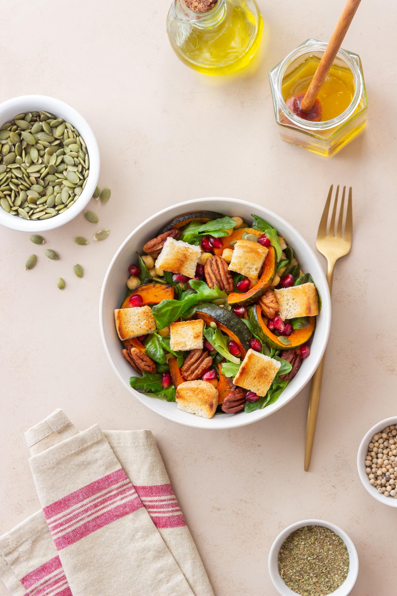 Bright bowl with roasted vegetables and herbs